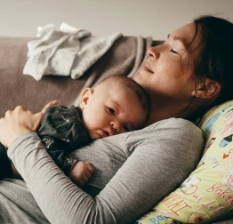 Mom hugging her baby