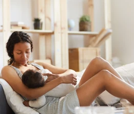 Mom feeding her baby